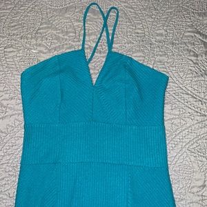 Bebe Turquoise dress past the knee with a slit